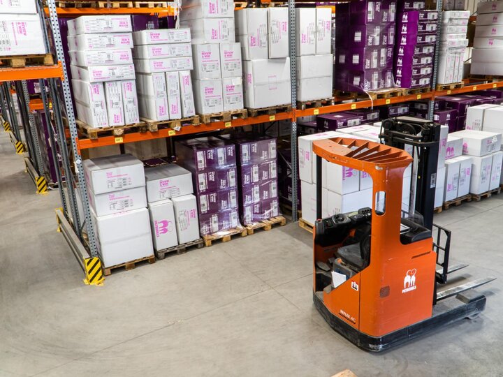 Forklift in warehouse